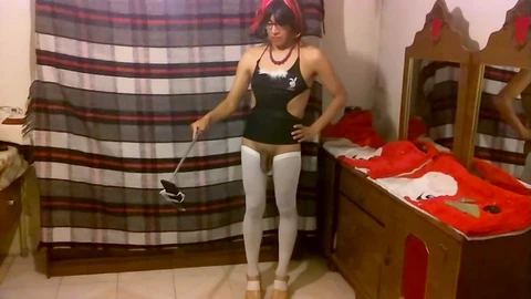 Joselynne, the red-haired crossdresser, struts in stilettos and pantyhose on webcam