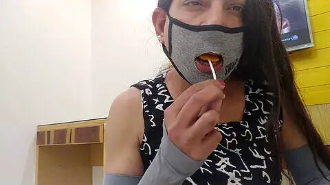 Little slut, lollipop in mouth