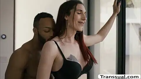 Busty dark-haired trans Melanie Brooks tries anal with a hung black guy